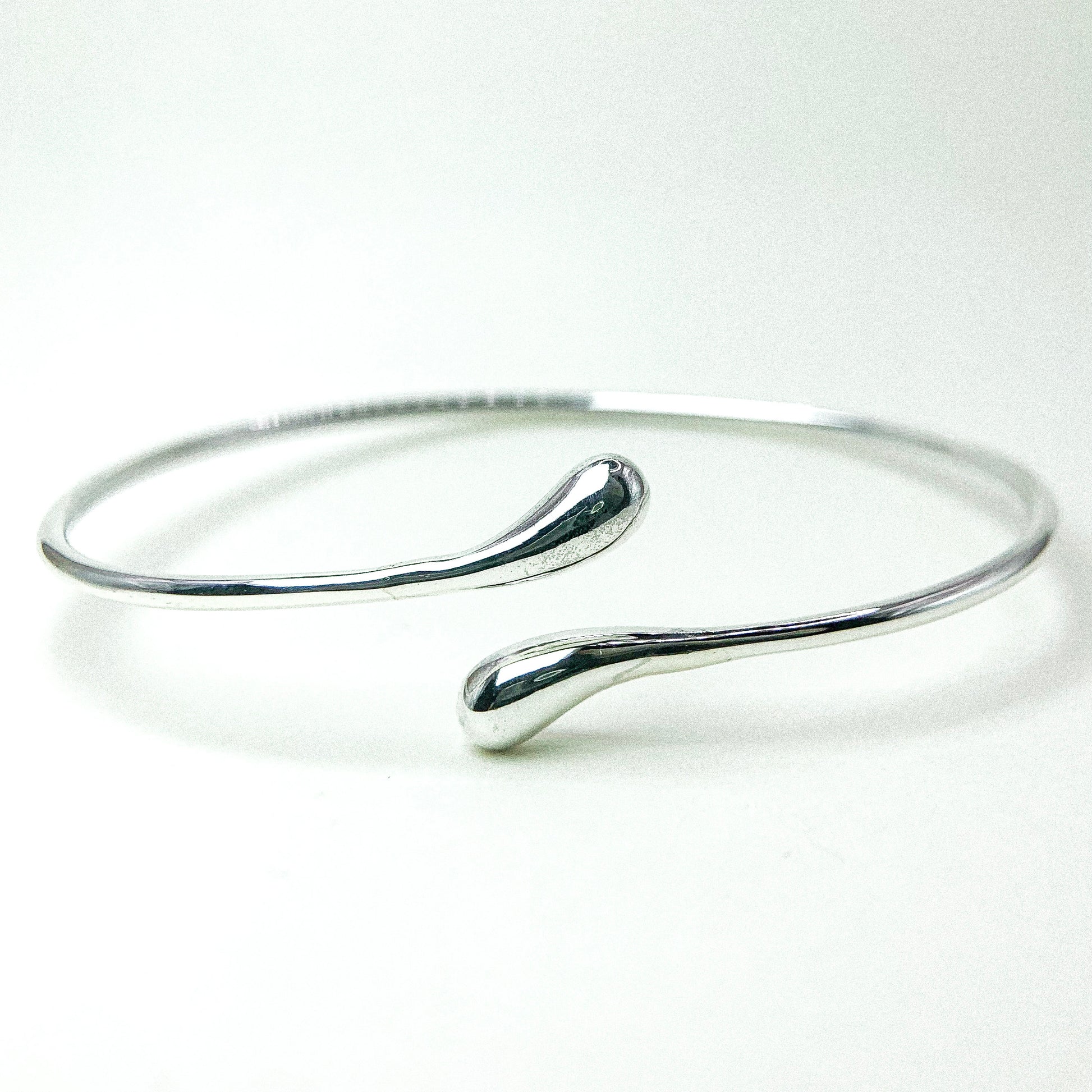 Drop Twist Open Silver Bangle