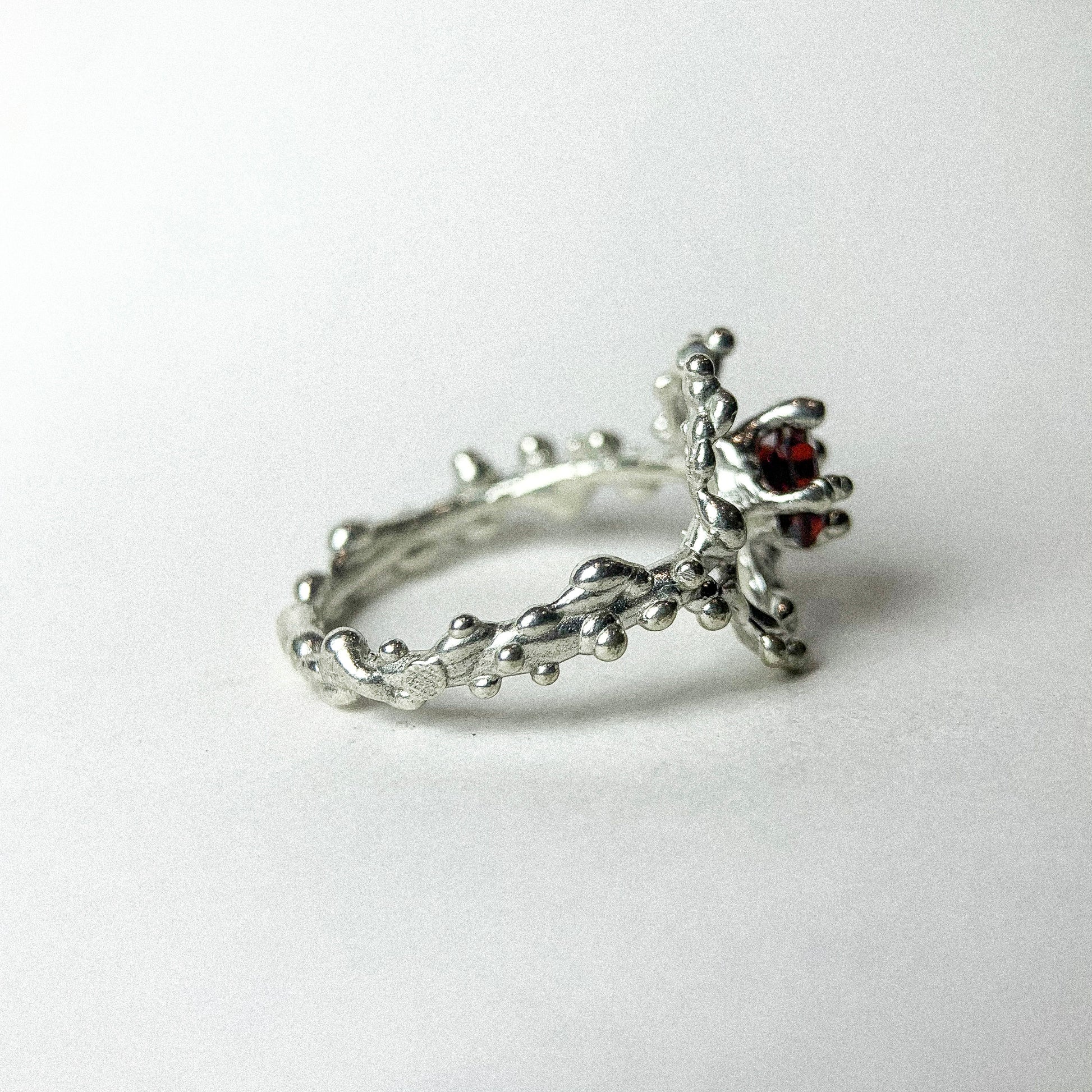 Garnet Flower Silver Ring — detail view