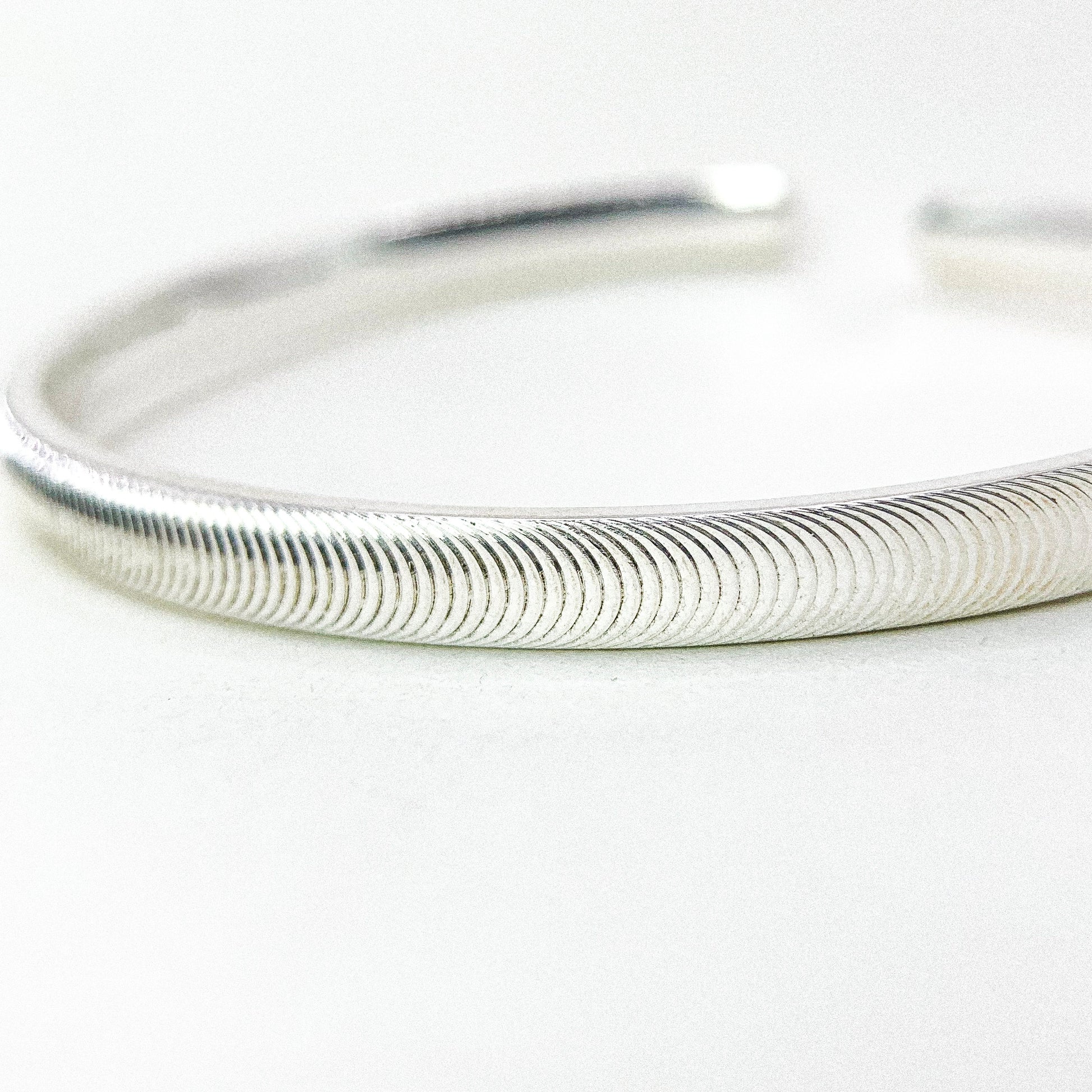 Cat Eye Effect Silver Bangle — detail view