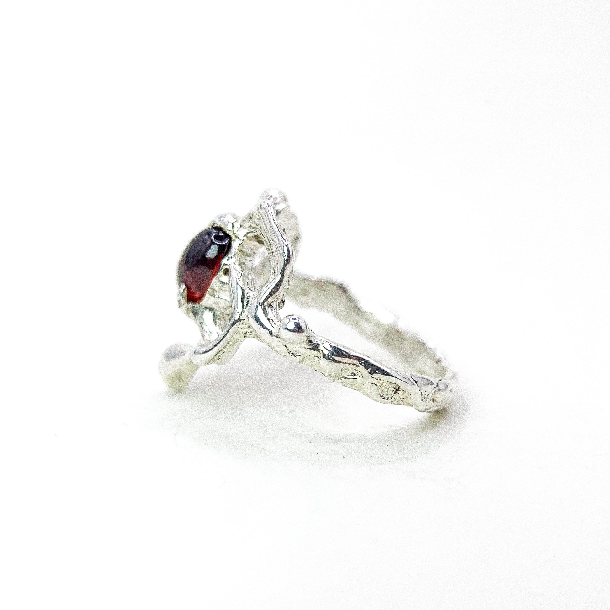Garnet Heart Silver Ring — detail view