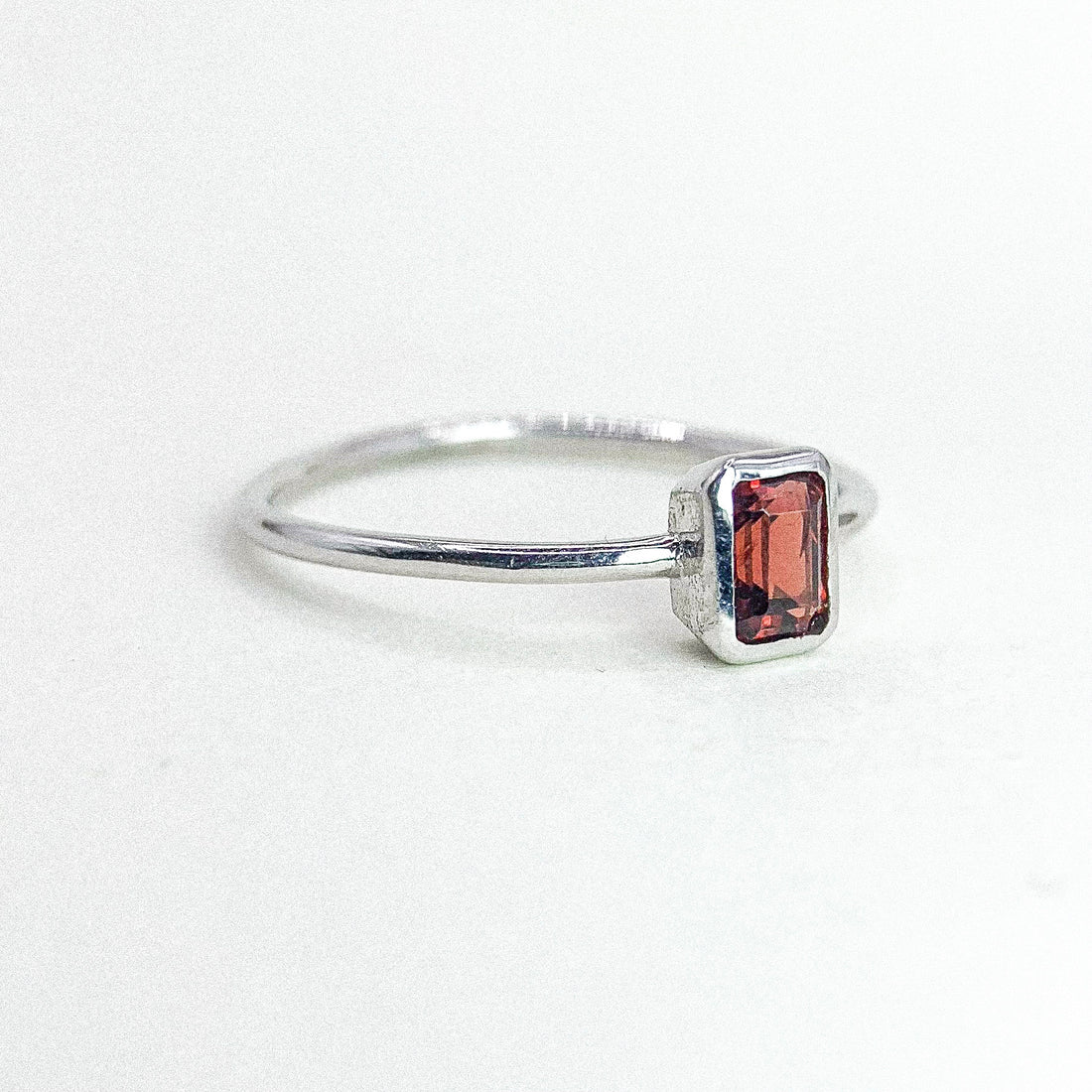 Garnet Bezel Thin Band Silver Ring