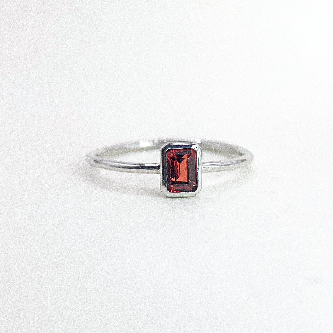 Garnet Bezel Thin Band Silver Ring