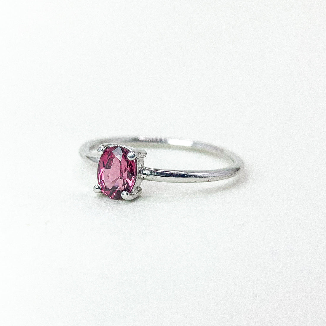 Oval Garnet Claw Thin Band Silver Ring