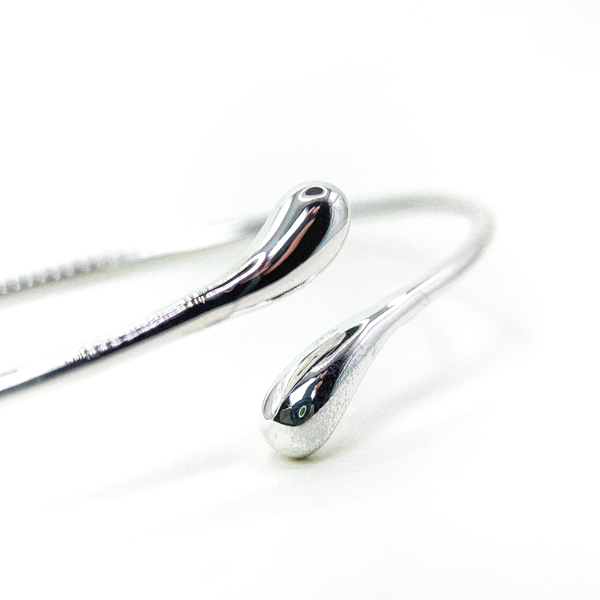 Drop Twist Open Silver Bangle — detail view