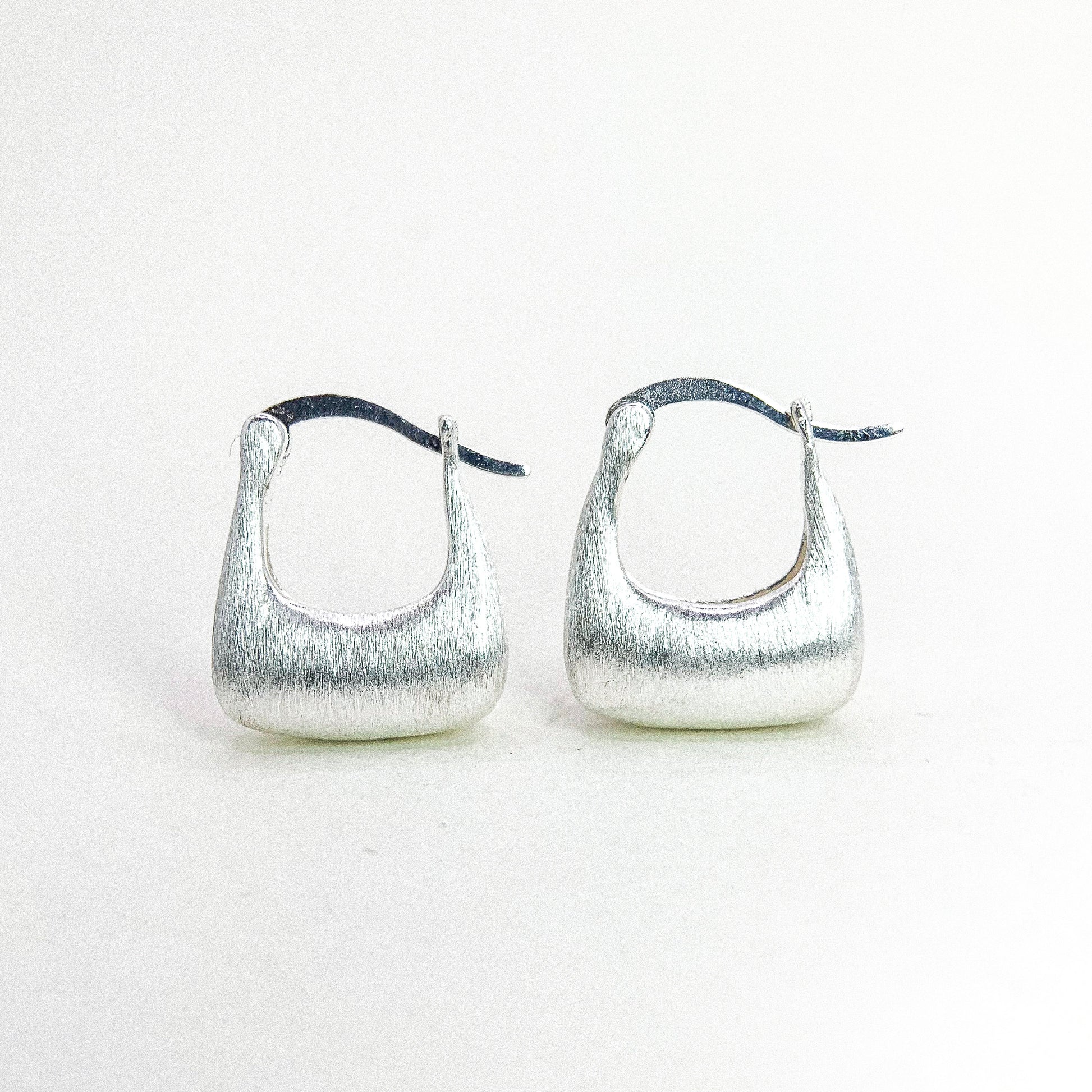 Square Bag Silver Ep Ear Hoop — detail view