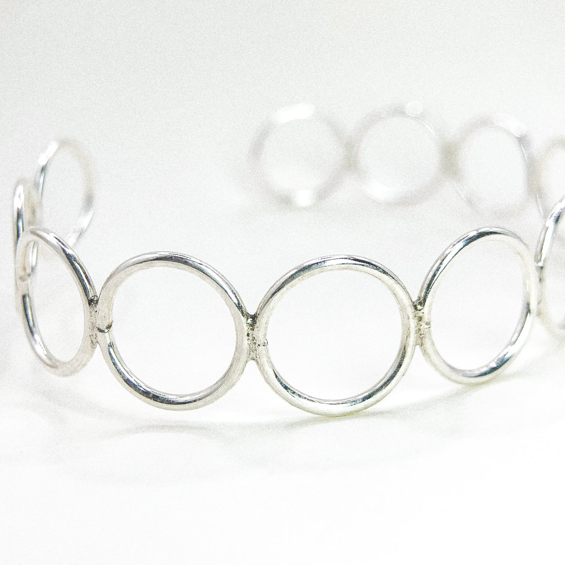 Multi Circle Silver Bangle