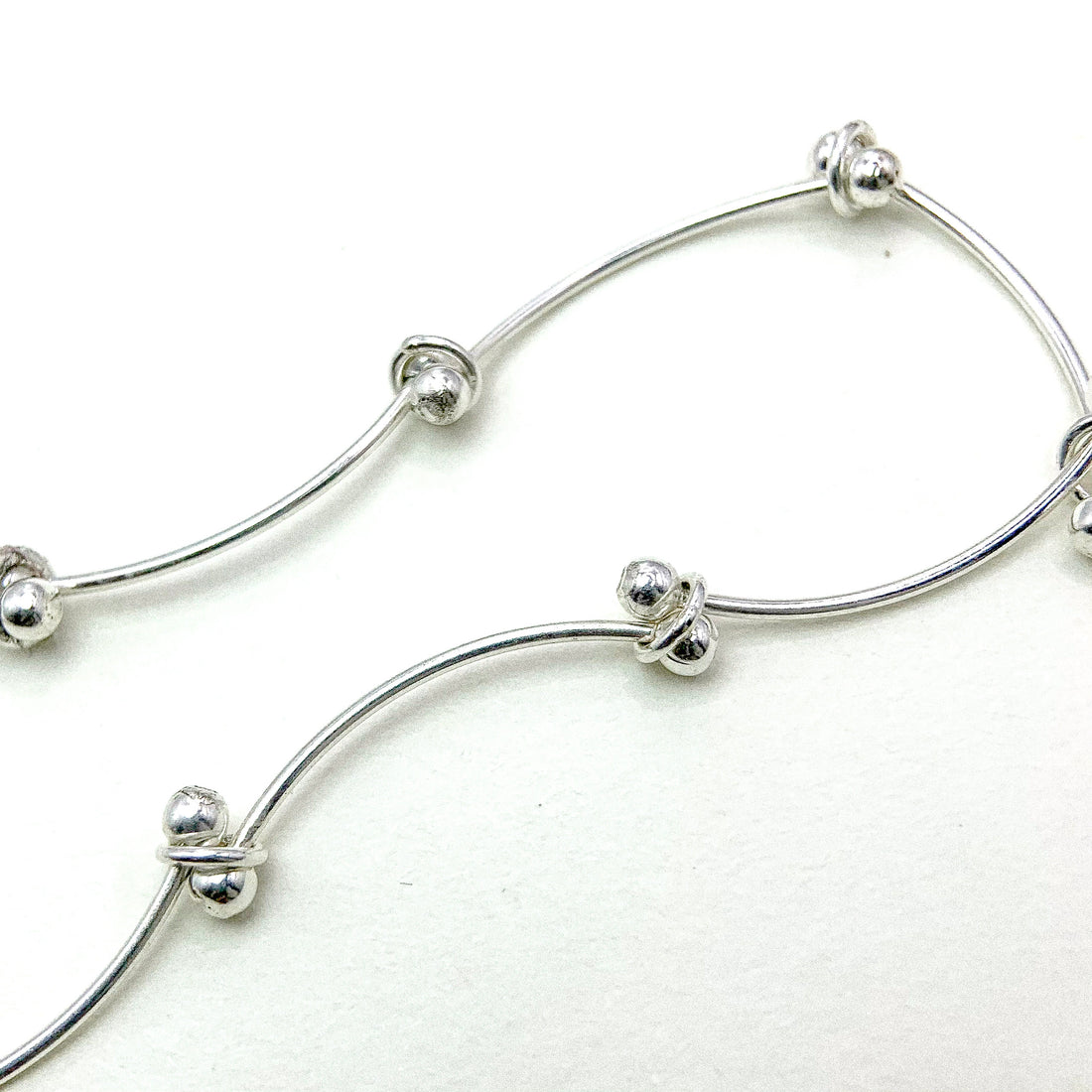 Multi Curve Line Ball Silver Bracelet